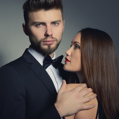 Sexy passion couple in love. Portrait of beautiful young man and