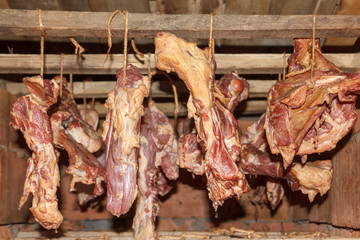 Smoked ham bacon and bones hanging