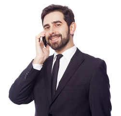 Handsome business man talking on the phone, isolated on white ba