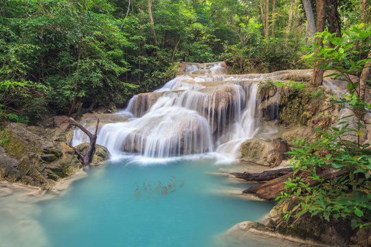 tropical fall at Erawan Waterfall at Kanchanaburi Thailand © Noppasinw