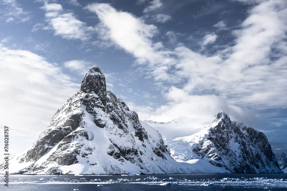 Wall mural snow-capped mountains in antarctica