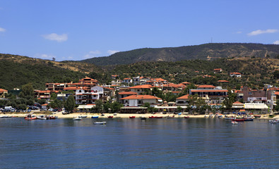 Fototapeta na wymiar Ouranoupoli on coast of Athos in Greece.