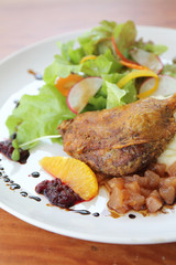 Duck confit , Roasted duck with blueberry sauce