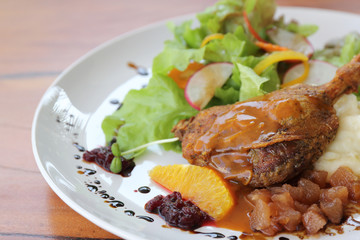 Duck confit , Roasted duck with blueberry sauce