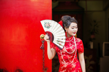 Chinese woman red dress traditional cheongsam