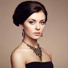 Fashion portrait of elegant woman with magnificent hair