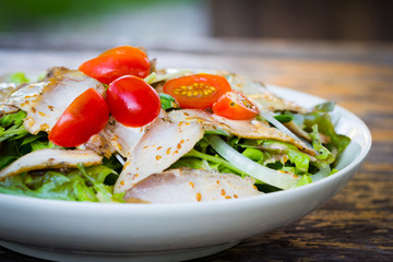 Roasted pork salad on plate