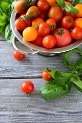 Cherry tomatoes and basil top view