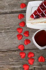 Cup of tea, piece of cake and red heart
