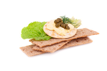 Crackers with fresh vegetables and butter
