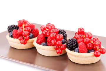 Fresh ripe berries in tartlets