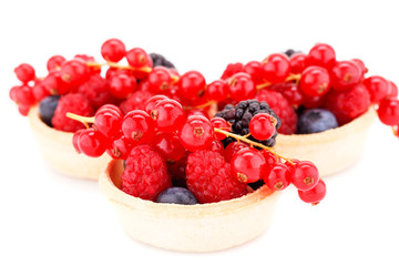 Fresh ripe berries in tartlets