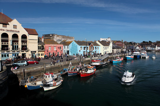 Weymouth harbour on a bright sunny summer day