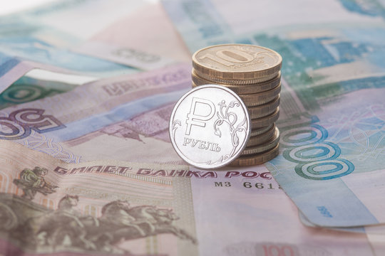 New russian ruble coin and banknotes