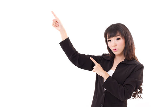 young business woman point her both fingers up to blank space