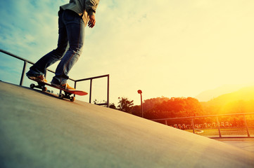 skateboarding legs at skatepark © lzf