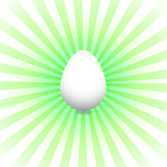 Weisses Ei mit grünen Strahlen