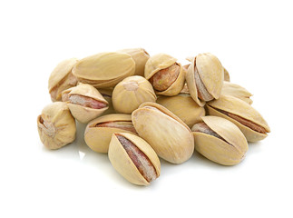 toasted pistachios on a white background
