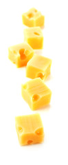 Cubes of cheese isolated on white background