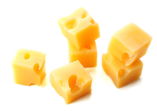 Cubes of cheese isolated on white background