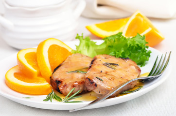 Grilled steak with orange sauce