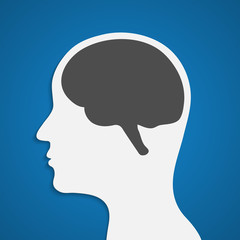 Silhouette of a human head with brain. Vector illustration.