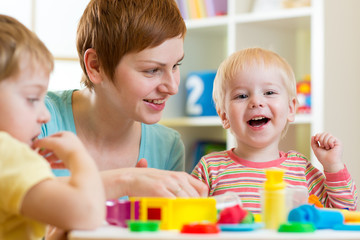 kids or children and mother play colorful clay toy