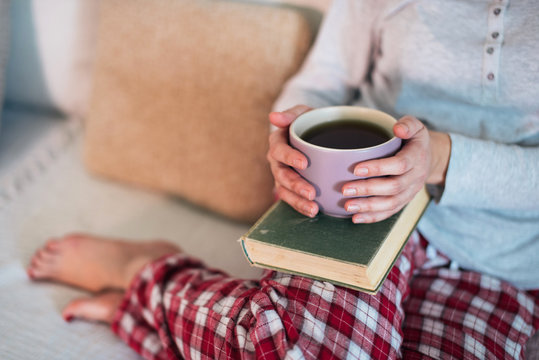 Drinking tea and reading book