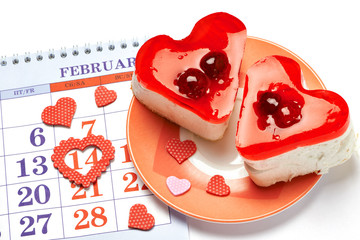 Two jelly heart-shaped cakes and calendar