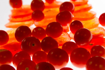 backlit sliced red tomatoes