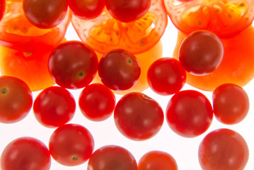backlit sliced red tomatoes