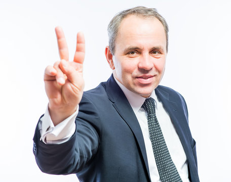 Man Showing Victory Or Peace Sign