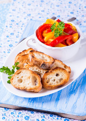 Toasted crusty baguette with roasted peppers