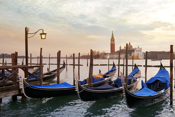 venetian gondolas moored - obrazy, fototapety, plakaty
