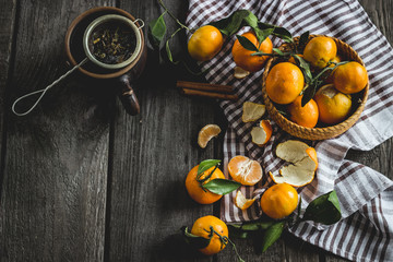 tangerines on a wooden table in style a vintage