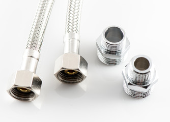 elastic metal fiber water pipe with connectors on white