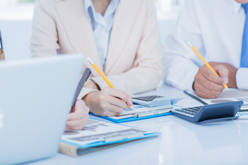 Business people discussing the charts and graphs showing the res