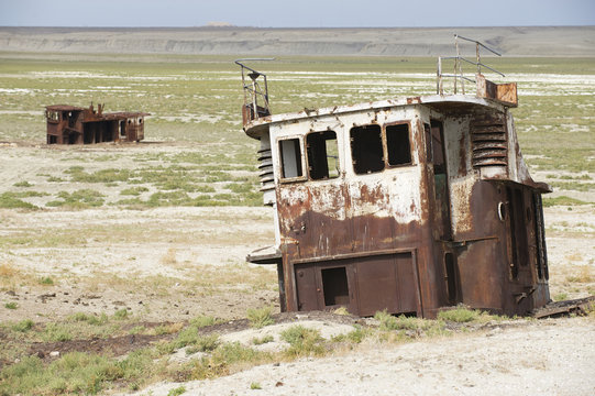 Remains Of Fishing Boats At The Sea Bed Of Aral Sea, Kazakhstan