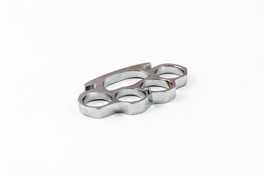 Brass knuckles weapon with white background