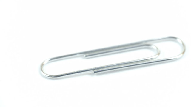 The metal paper clip on a turn around view