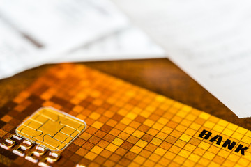 Credit card and check from shopping on the table