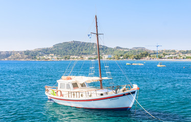 Yacht on the Mediterranean coast in the resort of Faliraki. Rhod