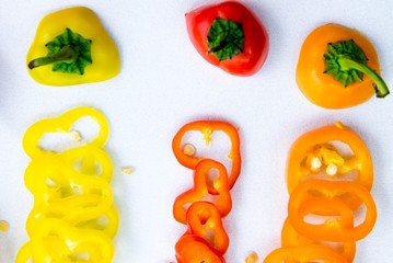 red, yellow, orange hot peppers sliced