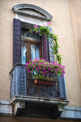 Fototapeta na wymiar window in an old building in Venice, Italy.