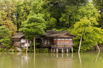 Fototapeta na wymiar Traditional japanese house on the water columns