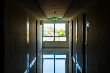 Corridor with light at window