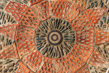 Pavement texture with gears and bricks in Montjuic, Barcelona, S