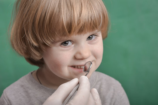 Small child and dental instrument