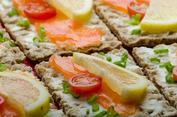 kneckebrot spread cheese with smoked salmon and cherry