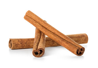 Cinnamon sticks on white